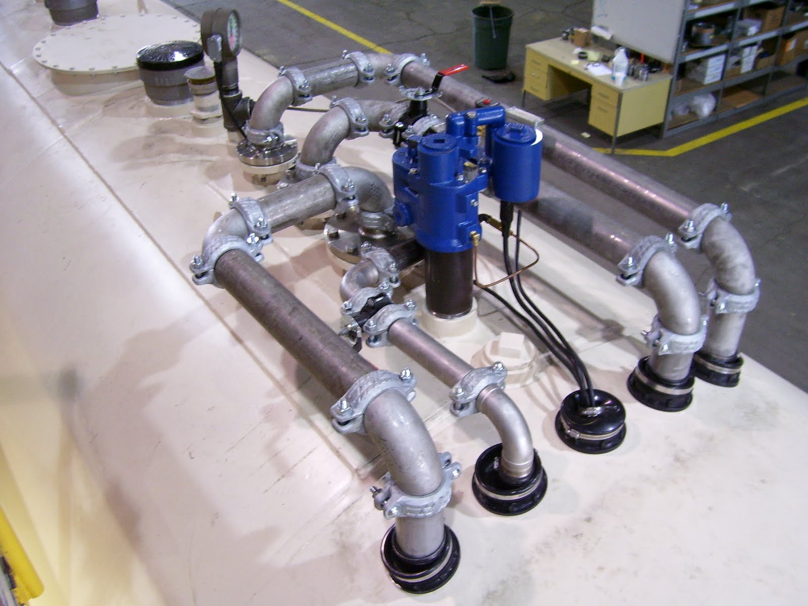 Tank top piping fabrication